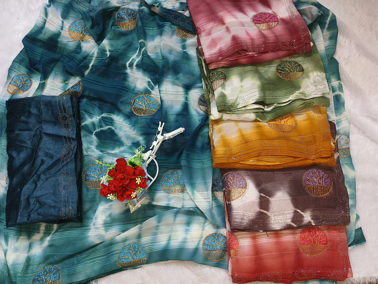 Embroidery Teal Blue Georgette saree