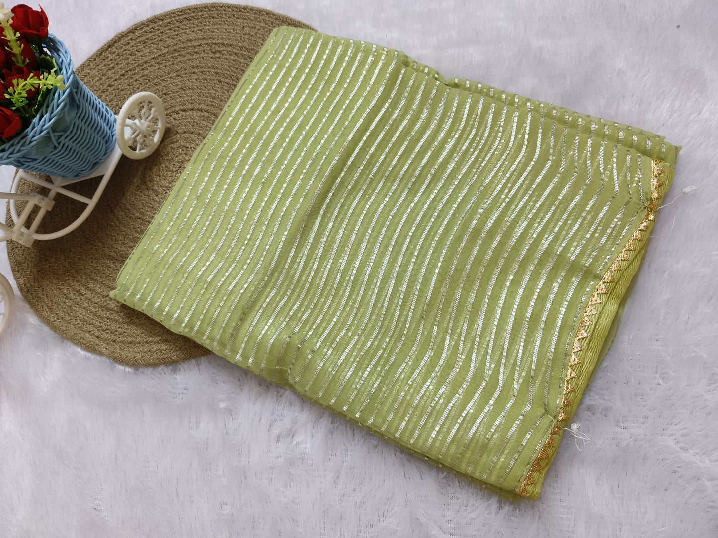 Pistachio Green Zari Woven Georgette Saree